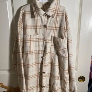 Plaid button up. Worn a few times. Fits a small to large.
#fall
#plaid